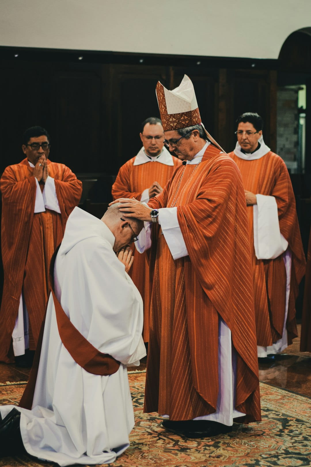 Catholic priest in church — Pre-Cana review access for parish marriage preparation